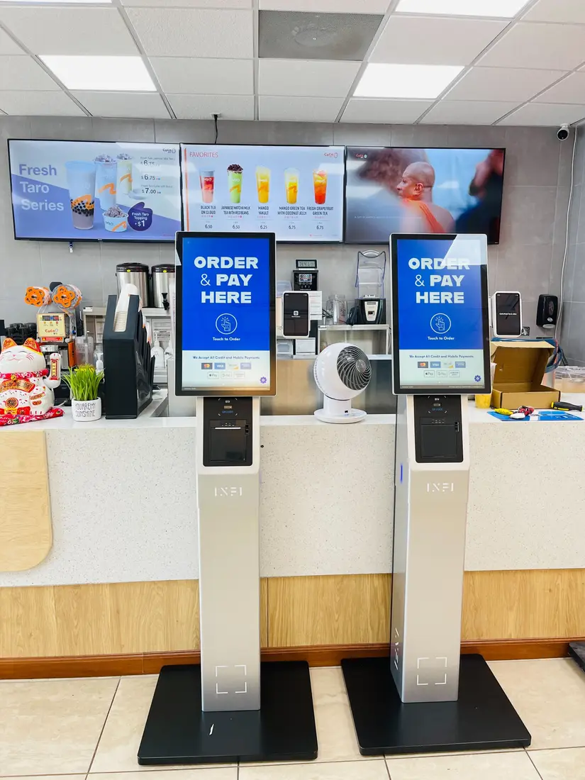 Two INFI kiosks in a bubble tea shop