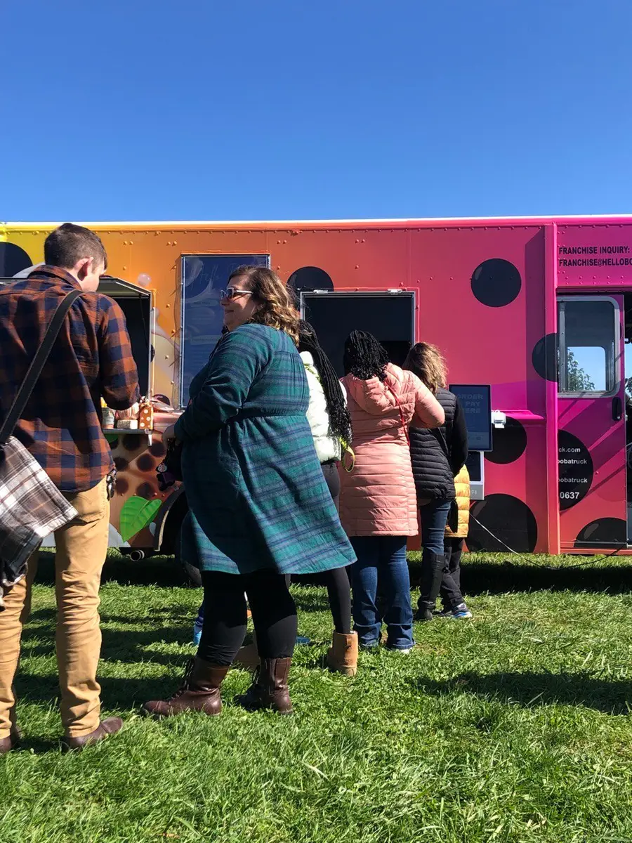 A line of customers at a boba food truck